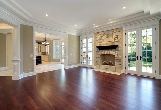 beautifully finished wood flooring in a spacious living room